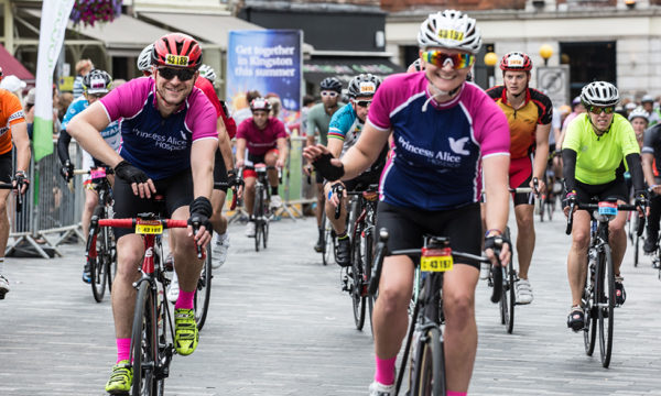 Cyclists in the RideLondon event wearing Princess Alice Hospice tops