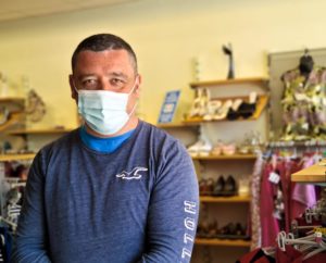 A retail volunteer in a Princess Alice Hospice shop