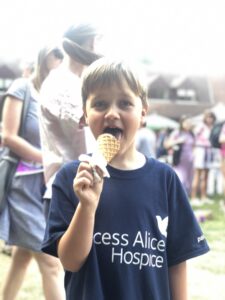 Young boy eating an ice cream