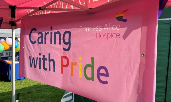 Caring with pride banner for Surrey Pride 2024