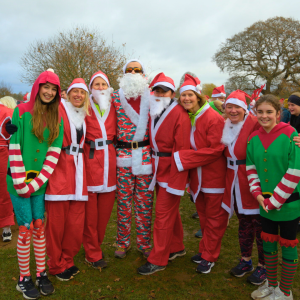 The Tice family dressed as Santa