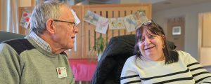 compassionate neighbour session, two smiling people