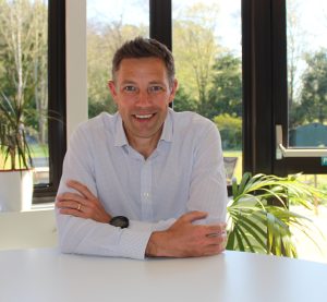 James Clark smiling at the camera