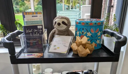 Carers coffee morning trolley with cups and coffee