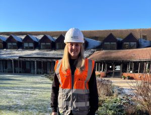 Sophie in hard hat and hi viz