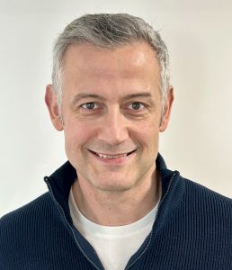 H&S shot of Guy smiling at the camera